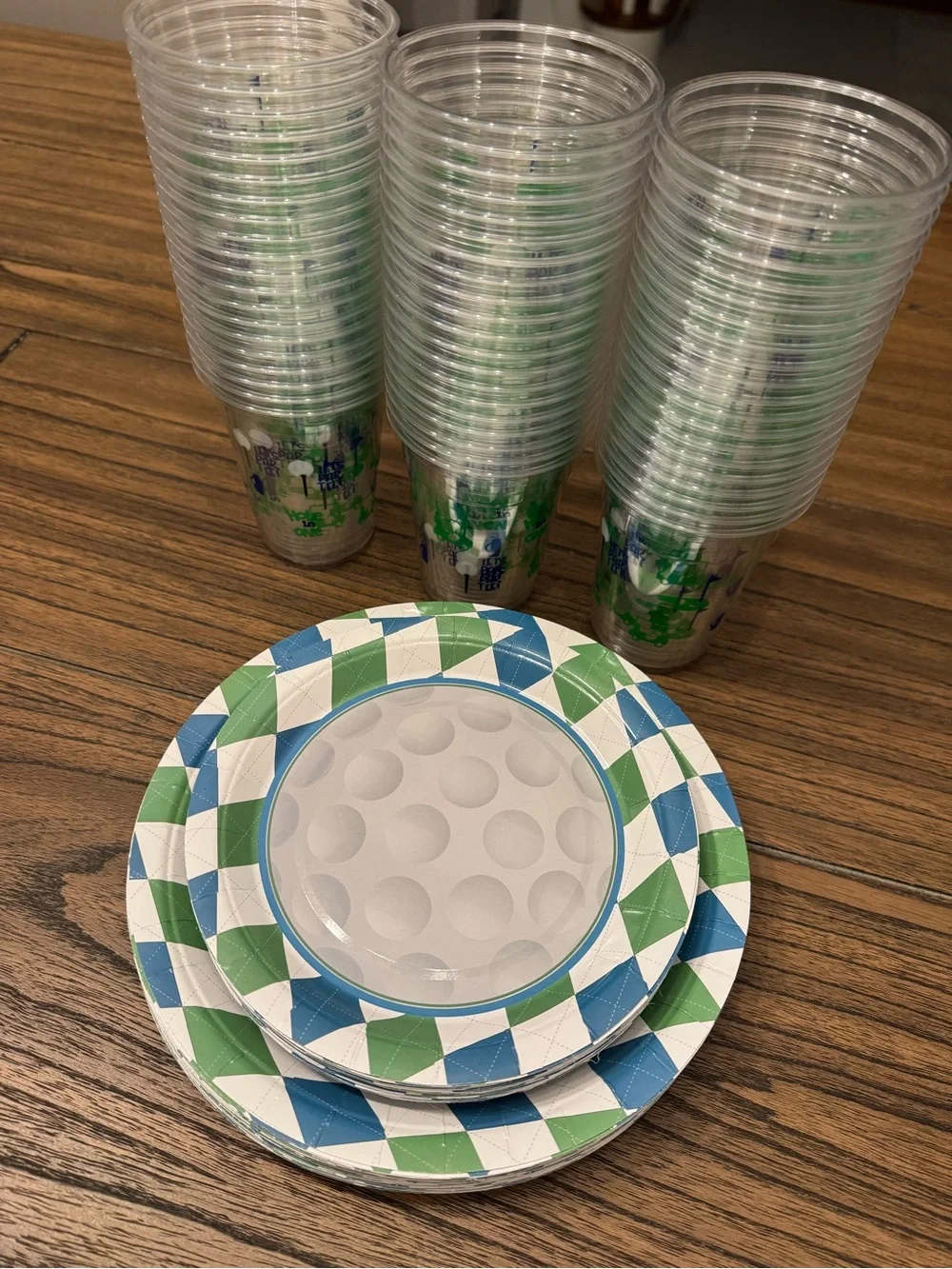 Golf theme paper plates (30 of each) and plastic cups (60)